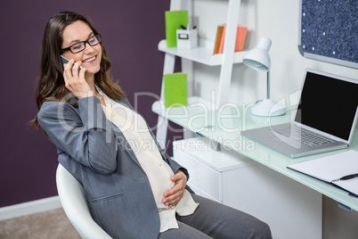 Pregnant woman on the phone