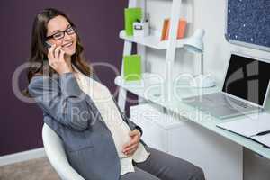 Pregnant woman on the phone