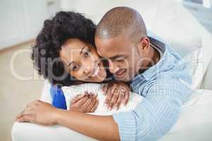 Portrait of smiling couple on the sofa