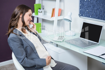 Pregnant woman on the phone