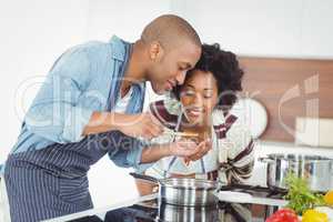 Happy couple cooking together