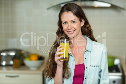 Smiling woman holding a glass