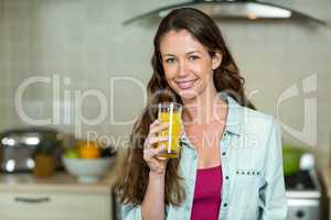 Smiling woman holding a glass