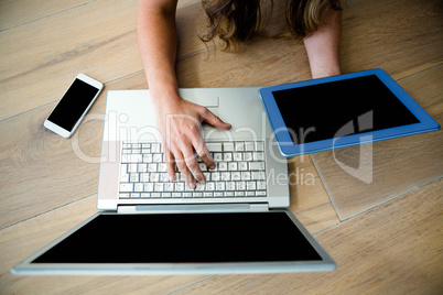 business woman on a laptop and a tablet