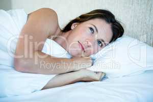 woman lying in her bed