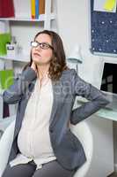 Pregnant woman having a back pain