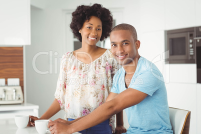 Smiling couple looking at the camera