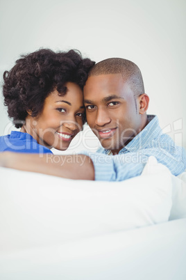 Portrait of smiling couple on the sofa