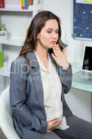 Pregnant businesswoman getting morning sickness