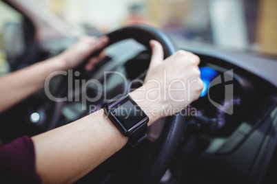 Close up of driver with smart watch