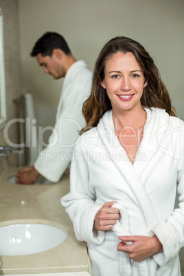 Young couple wearing bathrobe