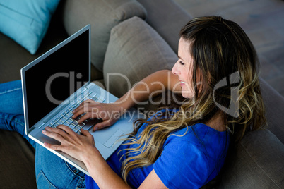 smiling business woman on a laptop