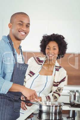 Happy couple cooking together