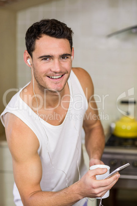 Young man listening to music