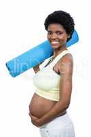 Pregnant woman holding exercise mat