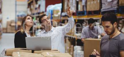 Portrait of smiling warehouse managers