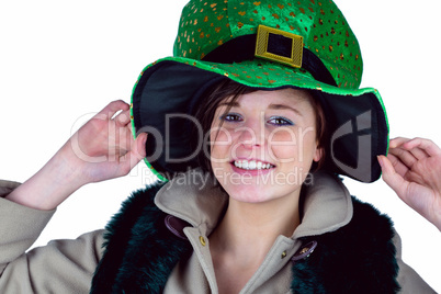 Pretty brunette wearing green hat
