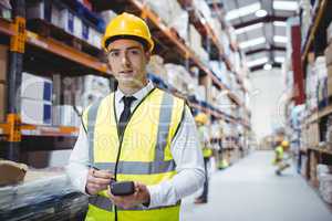 Portrait of smiling warehouse manager