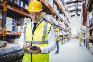 Portrait of smiling warehouse manager