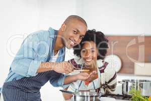 Happy couple cooking together