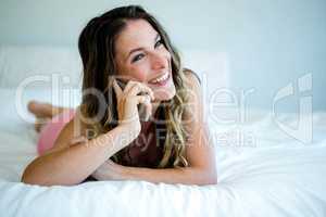smiling woman on the phone