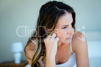 anxious woman with her head in her hands