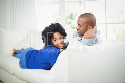 Portrait of smiling couple on the sofa