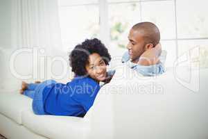 Portrait of smiling couple on the sofa