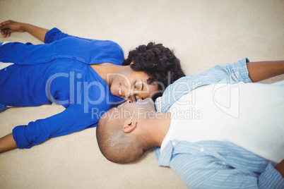 Peaceful couple lying on the floor