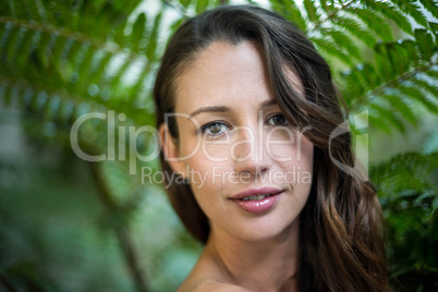 Beautiful woman standing outdoors in garden