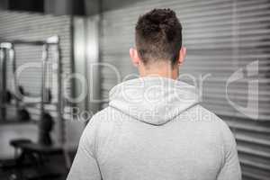 Rear view of man with grey jumper