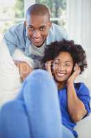 Portrait of smiling couple in the living room