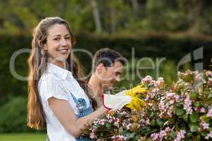Man and woman gardening together