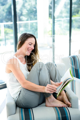 smiling woman reading a book