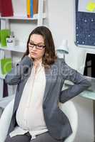 Pregnant woman having a back pain
