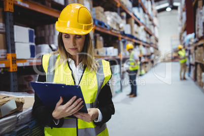 Portrait of smiling warehouse manager