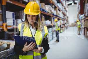 Portrait of smiling warehouse manager