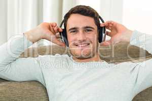Portrait of young man listening to music