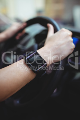 Close up of driver with smart watch