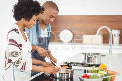 Happy couple cooking together