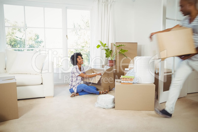 Happy couple with boxes