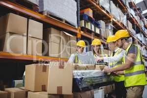 Portrait of smiling warehouse managers