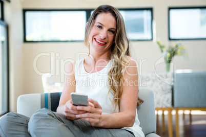 smiling woman on her mobile phone