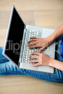 femaale hands typing on a laptop computer