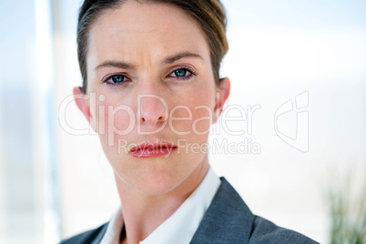 business woman staring into the camera