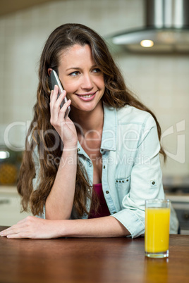 Young woman talking on mobile phone