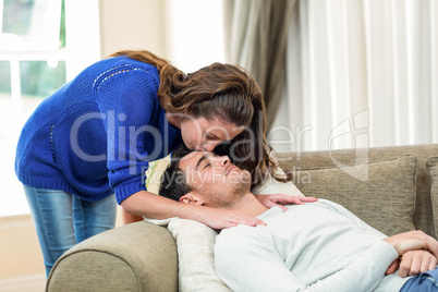 Woman kissing on her mans forehead