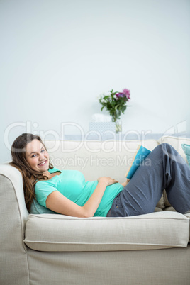 Pregnant woman reading a book