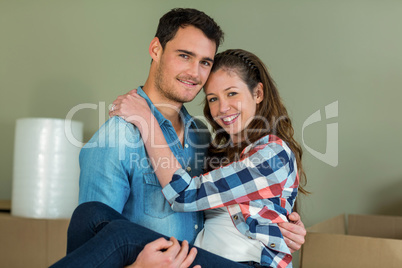 Man lifting woman in his arms