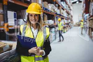 Portrait of smiling warehouse manager